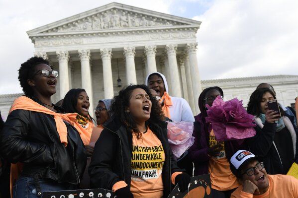 Justices take up high profile case over young immigrants AP News